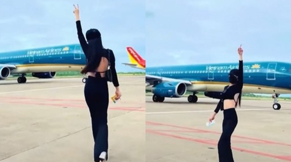 베트남 여성이 틱톡에 올리려는 목적으로 이동하는 활주로에 무단으로 침입해 춤추는 동영상을 촬영했다. / tuoitreTV