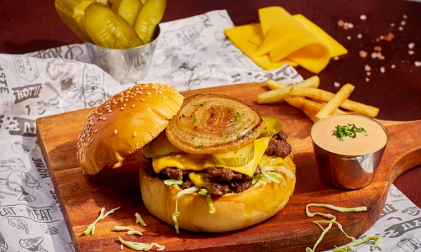 Burger and French fries are served at Chops Old Quarter restaurant in Hanoi. Photo courtesy of the restaurant